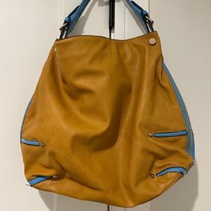 Tan purse with blue details